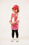 Little Girl Fashion Model With Red Cap Stock Photo