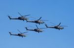 Mi-28n (havoc) Attack Helicopters Of Aerobatic Team Berkuty Fly Stock Photo