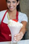 Pretty Girl Serving Strawberry Shake Stock Photo