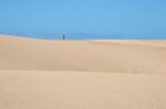 Nudist Walking On The Sand Dunes Near Mas Palomas Gran Canaria Stock Photo