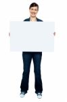 Fashionable Trendy Woman Holding Blank Ad Board Stock Photo