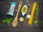 The Thin Spaghetti On Black Wooden Background. Yellow Italian Pa Stock Photo