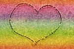 Heart Drawn In The Multicolored Sand Stock Photo