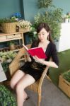 Portrait Of Thai Adult Women Office Beautiful Girl Reading Book Stock Photo