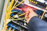 People Fix Node Fiber Optic In Network Room Stock Photo