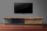 Led Tv On Concrete Wall With Wooden Furniture In Living Room Stock Photo