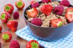 Bran Flakes With Fresh Raspberries And Strawberries Stock Photo