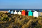 Colourful Beach Huts On Southwold Beach Suffolk Stock Photo