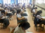 Blur Background University Students Writing Answer Doing Exam In Stock Photo