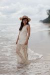 Portrait Of Smiling Face Of Young Asian Woman With Long Dress An Stock Photo