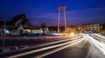 Giant Swing And Wat Suthat At Dusk In Bangkok Stock Photo