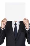 Businessman Holding Blank Paper Stock Photo