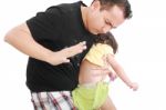 Father Smacking His Child Stock Photo