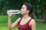 Young Woman Drinking Water Stock Photo