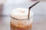 Iced Mocha Coffee In Glass On The Table Stock Photo