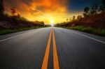 Beautiful Sun Rising Sky With Asphalt Highways Road In Rural Sce Stock Photo