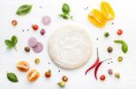 The Ingredients For Homemade Pizza On White Wooden Background Stock Photo