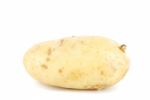 Unpeeled Yellow Potato On White Stock Photo