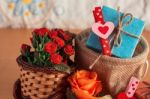 Gift Box With Flowers On The Basket Stock Photo