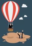 Businessman In Hot Air Balloon Get Away From Quicksand Stock Photo