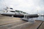 Mooring Bollard With Boats In The Background Stock Photo