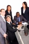 Multi Ethnic Team During Meeting Stock Photo