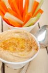 Fresh Hummus Dip With Raw Carrot And Celery Stock Photo