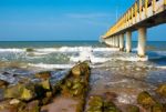 Pier Stretching Into The Sea Stock Photo