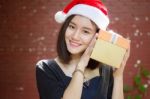 Portrait Of Thai Adult Student University Beautiful Girl Hold Gift Box In Hands Stock Photo