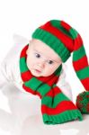 Baby With Christmas Hat And Scarf Stock Photo