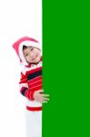 Christmas Asian Boy With Empty Banner Stock Photo