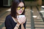 Portrait Of Thai Adult Glasses Beautiful Girl Drinking Coffee Stock Photo