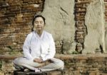 Buddhist Woman In Meditation Stock Photo