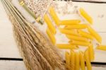 Italian Pasta Penne With Wheat Stock Photo