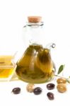 Green And Black Olives With Olive Oil Bottle Stock Photo