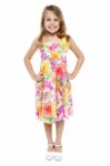 Adorable Girl Child In Floral Frock Stock Photo