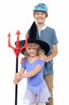 Boy And Girl Wearing Halloween Costume Stock Photo