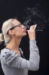 Smoking Electric Cigarettes On The Black Background Stock Photo