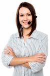 Smiling Female Customer Care Executive Stock Photo