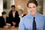 Business Team At Work, Manager In Foreground Stock Photo