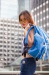 Portrait Of Thai Chinese Adult Beautiful Girl Denim Blue Bag Travel Relax And Smile Stock Photo