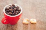 Eq Alphabet Biscuit With Red Coffee Cup Stock Photo