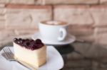 Blueberry Cheesecake And Hot Coffee Stock Photo