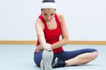 Happy Young Woman Practicing Sport In Gym Stock Photo