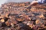 Traditional Meat Grilled On The Grill In The Argentine Countryside Stock Photo