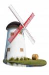 Windmill And Straw In The Lawn Stock Photo