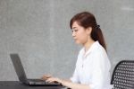 Portrait Of Thai Adult Businesswoman Beautiful Girl Using Computer Notebook Stock Photo