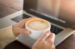 Woman Working With Laptop And Hot Coffee Stock Photo