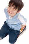 Top View Of Cute Kid With Books Stock Photo