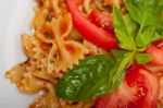 Italian Pasta Farfalle Butterfly Bow-tie And Tomato Sauce Stock Photo